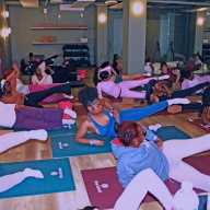 Attendees participate in a Pilates session during IYKYK Collective’s second annual Women’s Wellness Day, celebrating International Women’s Month.