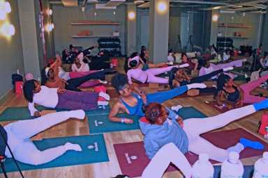Attendees participate in a Pilates session during IYKYK Collective’s second annual Women’s Wellness Day, celebrating International Women’s Month.