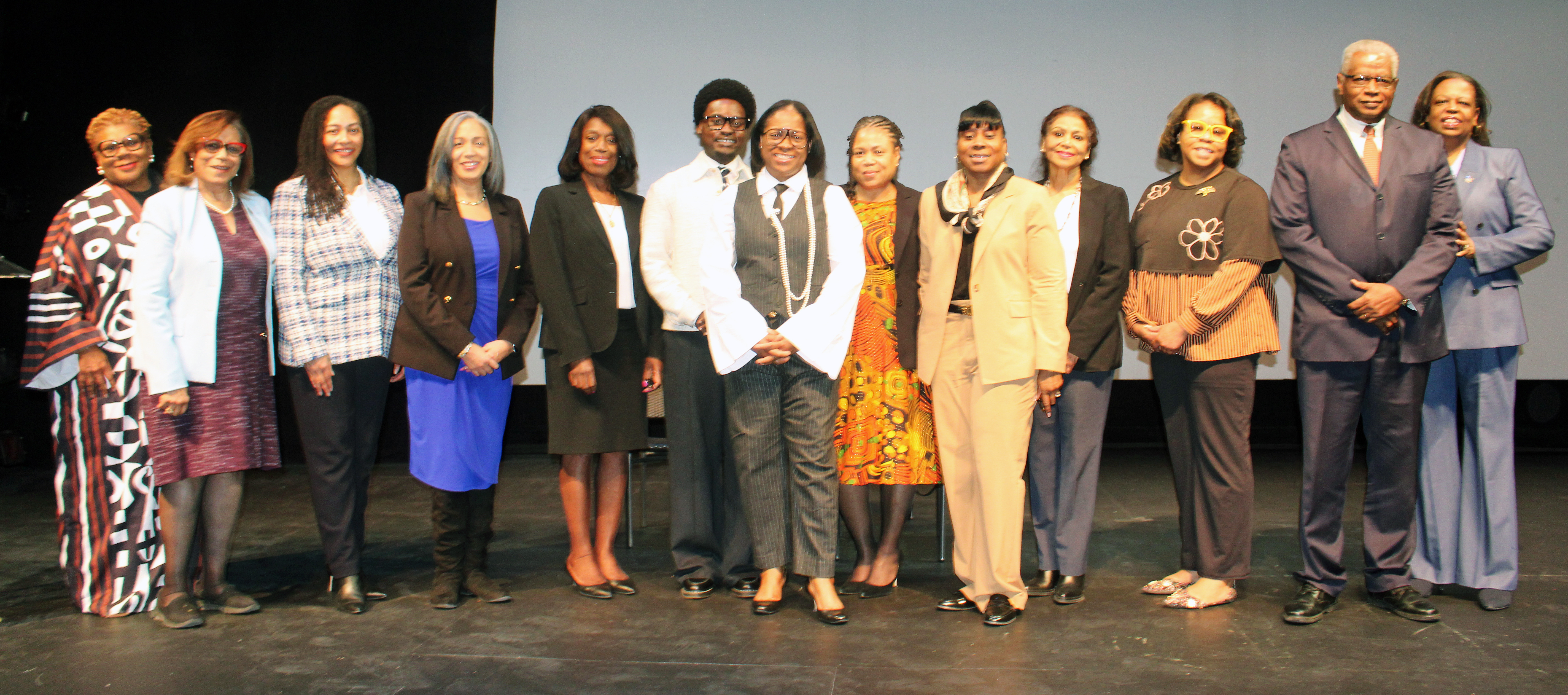 Members of the Macon B. Allen Black Bar Association hosted a powerful BHM commemoration, and honored its 100th Year Anniversary at the Queens Theatre in Flushing Meadows, Corona, on February 19. Pictured from left are Beverly George, Esq.Hon. Janice A. Taylor. Hon. Cassandra A. Johnson, Hon. Lourdes A. Ventura, Hon. Valerie Brathwaite Nelson Regens Jean Baptiste (senior John Jay college) Hon. Nicole A. Mc Gregory Mundy, Jawan Finley, Esq., Hon. Melissa B. Deberry, Hon. Andrea S. Ogle, Hon. Fania Jean, Hon. Ulysses B. Leverett (ret.) and Hon. Marguerite A. Grays.