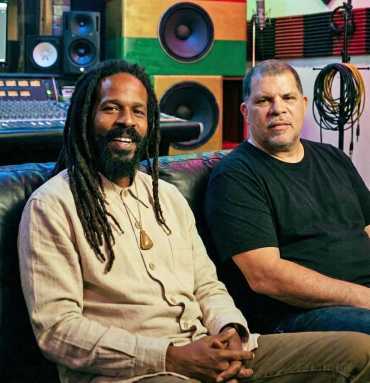 Amlak Redsquare, left, with DJ Baby Ace in the studio.