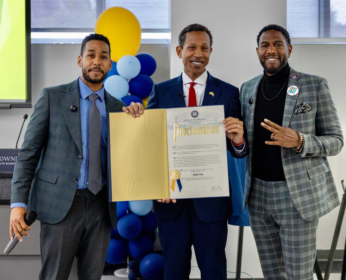 Brooklyn Borough President Antonio Reynoso, left, presented a Proclamation to Rapper and Civic Leader Moses Shyne Barrow, alongside Public Advocate Jumaane Williams at East Flatbush Young Men’s Mentorship Expo on Saturday, April 25.