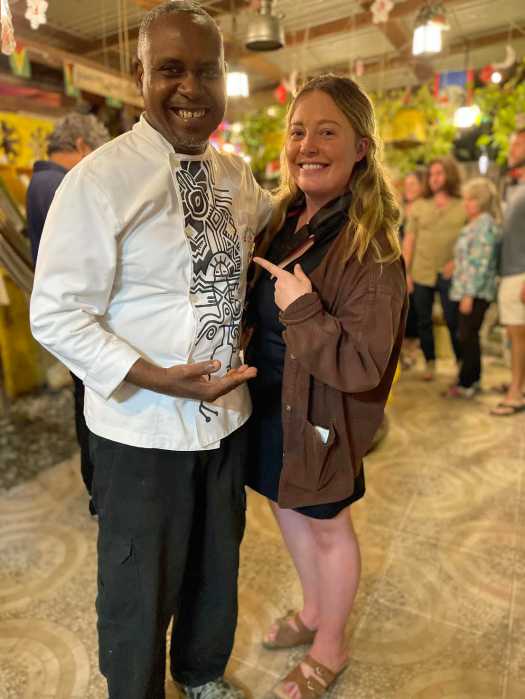 Proprietor of the Backyard Cafe in Georgetown, Chef Delven Adams, left, with Olivia Liveng, one of Time Magazine's journalists who placed the eatery on the publication's 2026 list of best places on the planet to visit.
