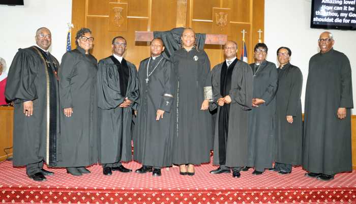 The Rev. Dr. Elizabeth Abel, UMC Long Island West District Superintendent, center, with clergy from the Brooklyn Downtown South Cooperative Parish of the United Methodist Church (UMC), otherwise known as Bold United Soul Seekers (BUSS), at the conclusion of Good Friday Worship Service at St. Mark's UMC in Flatbush, Brooklyn.