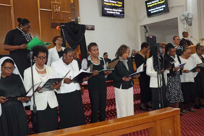 Fenimore Street UMC Combined Choir sings 'Jesus Dropped the Charges' before Pastor Roger Jackson brings the Second Word.