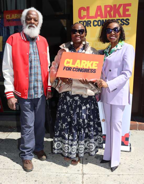 U.S. Rep. Yvette D. Clarke, right, with Community Activists Ernest Skinner, left, and Joan Bakiriddin.