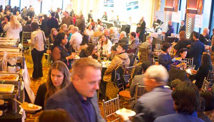 Attendees gather at the 30th Annual “Evening of Fine Food” hosted by Queens Centers for Progress at Terrace on the Park in Flushing Meadows-Corona Park.