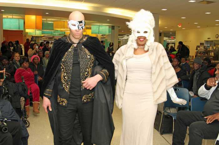 Opening up theme The Phantom of the Opera. Into the Mardi Gras finale, fashion evening wear. styles out the closet by Jackie Love. Models Sergio Delavicci and Camella Palmer.