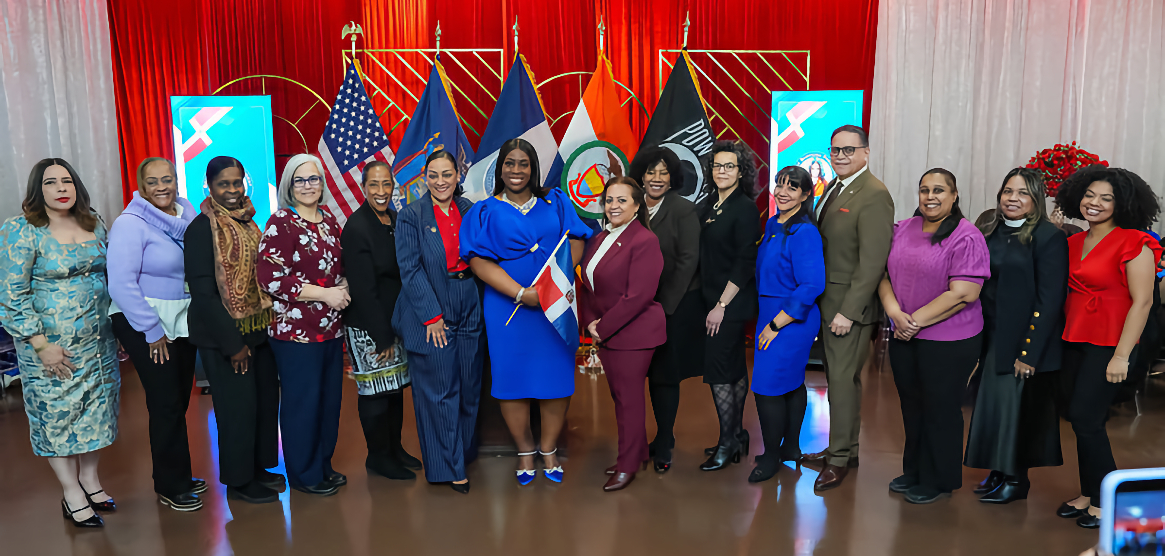 Bronx Borough President Vanessa L. Gibson, center, with Dominican Republic flag, with honorees and other patrons.