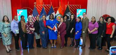 Bronx Borough President Vanessa L. Gibson, center, with Dominican Republic flag, with honorees and other patrons.