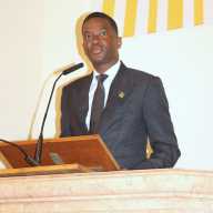 Grenada Prime Minister Dickon Mitchell eulogizes 'The People's Doctor,’ Roland Purcell, at massive funeral service at the Holy Family Roman Catholic Church on Flatlands Avenue in Canarsie, Brooklyn.
