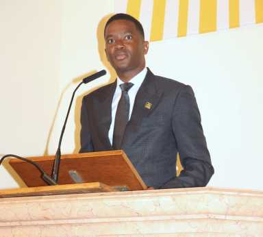 Grenada Prime Minister Dickon Mitchell eulogizes 'The People's Doctor,’ Roland Purcell, at massive funeral service at the Holy Family Roman Catholic Church on Flatlands Avenue in Canarsie, Brooklyn.
