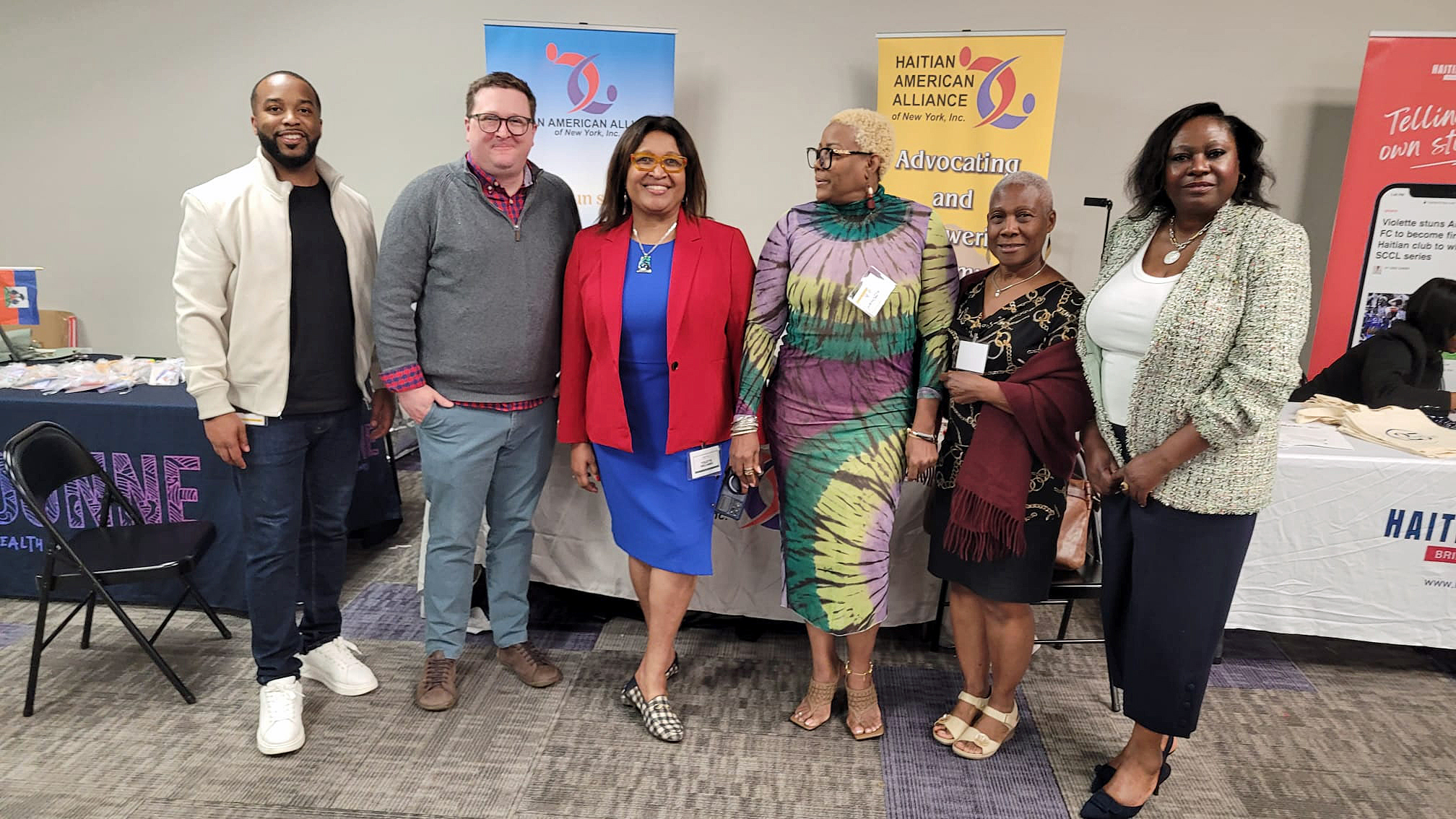 Staff and supporters of the Haitian American Alliance of New York, Inc. at a community event. From left: Colbert Saint-Laurent, director of Capacity Building; Geogg Pipoly, Esq.; Yolette Williams, president & CEO; Judith Wackman, DNP/PMHNP; Rosia Lamarre, DC; and Marjorie Bonhomme, PhD.