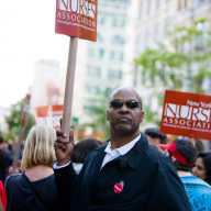 New York, USA - May 1, 2012: Man holding NY Nurses Association banner on Union Square during 1st May demonstration.
