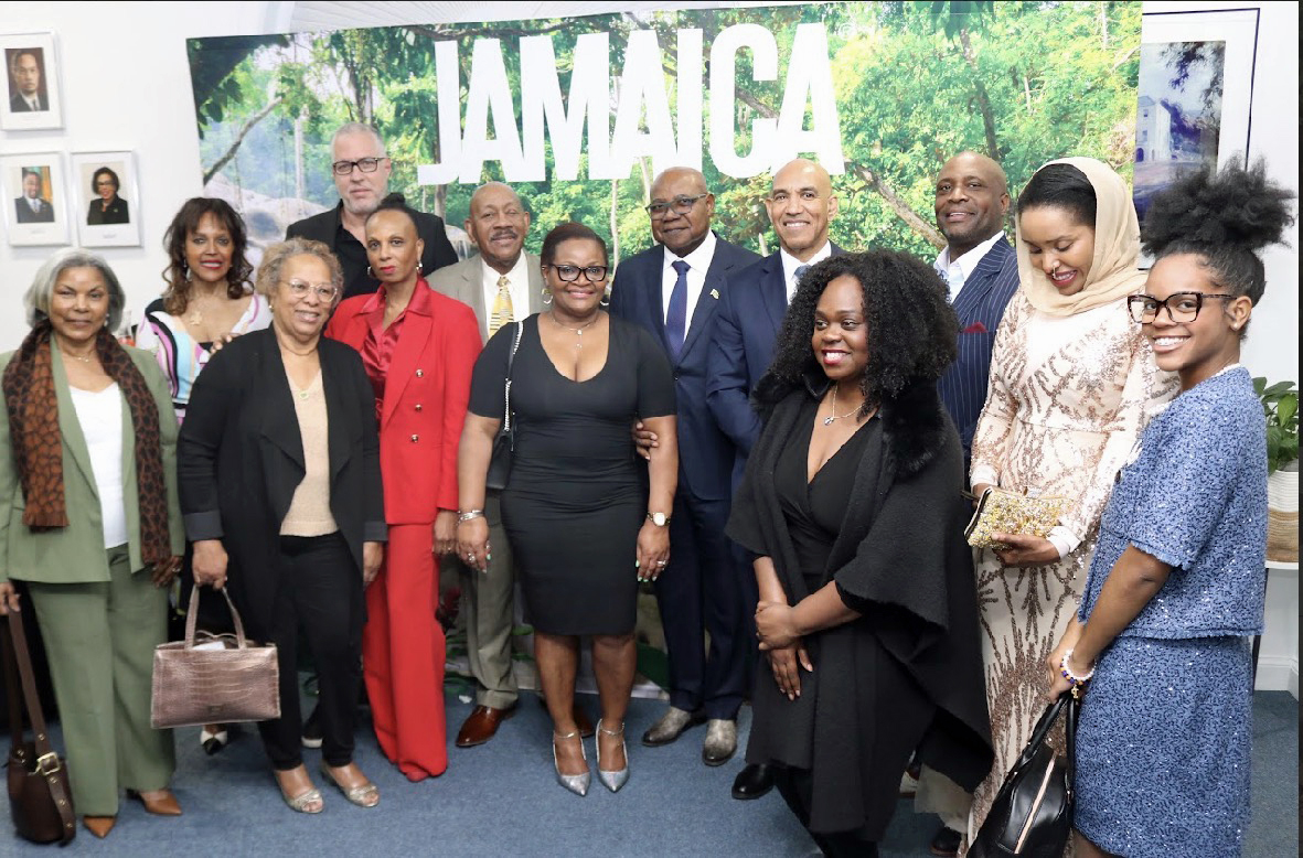 Minister of Tourism, Edmund Bartlett and Jamaica's Ambassador Antony Anderson (center right of picture) surrounded by members of the Diaspora in Washington D.C.
