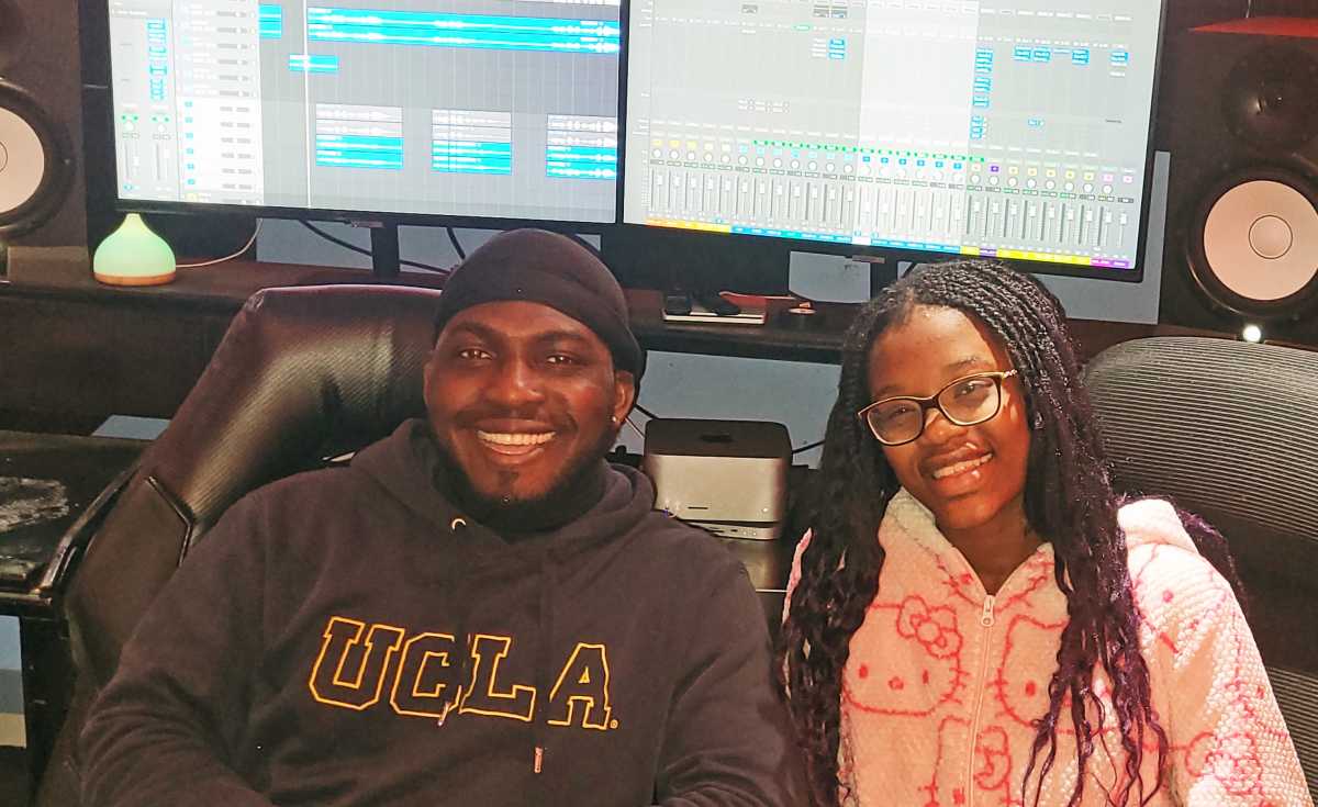 Producer Paul Drew Gad and 13-year-old singer Jazmin Headley in studio in New Jersey during a recording session for a re-imagined version of the 1975 classic “None A Jah Jah Children Nuh Cry.”