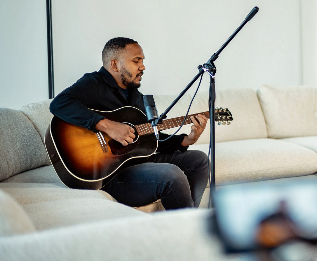 International recording artist Juke Ross, the Guyanese-born singer-songwriter recently hailed by Rolling Stone for his "aching" and "soulful" sound. Here he is jamming to his song "Coffee Love," which serves as a vibrant visual love letter to Guyana’s capital.