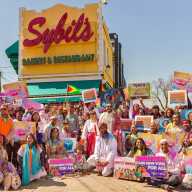 Founder of the Caribbean Equality Project (CEP) Mohamed Q. Amin, eighth from left (front) poses with members, and celebrants after leading the 38th Annual Phagwah Parade on March 29, in Richmond Hill Queens.