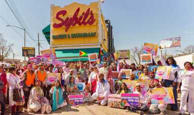 Founder of the Caribbean Equality Project (CEP) Mohamed Q. Amin, eighth from left (front) poses with members, and celebrants after leading the 38th Annual Phagwah Parade on March 29, in Richmond Hill Queens.