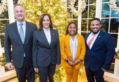 Vice President Kamala Harris and Second Gentleman Douglas Emhoff participate in a photo line with Troy Blackwell during a IGA Reception Monday, Dec. 12, 2022, at the Vice President’s Residence in Washington, D.C.