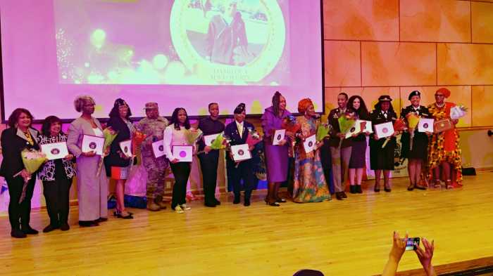 Honorees proudly pose after receiving their awards, representing branches including the U.S. Army, Army Reserve, Navy, and New York Army National Guard.