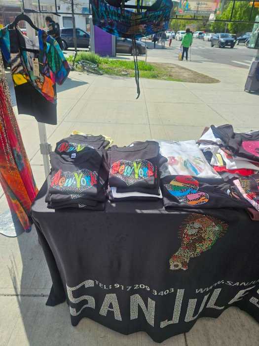 Bling Tees, African sustainable bags, and jewelry created by husband and wife, Sandra and Jules, of San Jules showcased their collection on Saturday, April 18, at Little Caribbean and I Am CaribBeing marketplace at the intersection of Washington Avenue and Empire Boulevard in Brooklyn. San Jules was created by the Trinidad nationals 22 years ago.