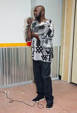 James Cordice, coordinator of the Vincentian Penn Relays initiative, addresses a reception.