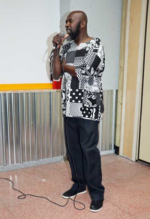 James Cordice, coordinator of the Vincentian Penn Relays initiative, addresses a reception.