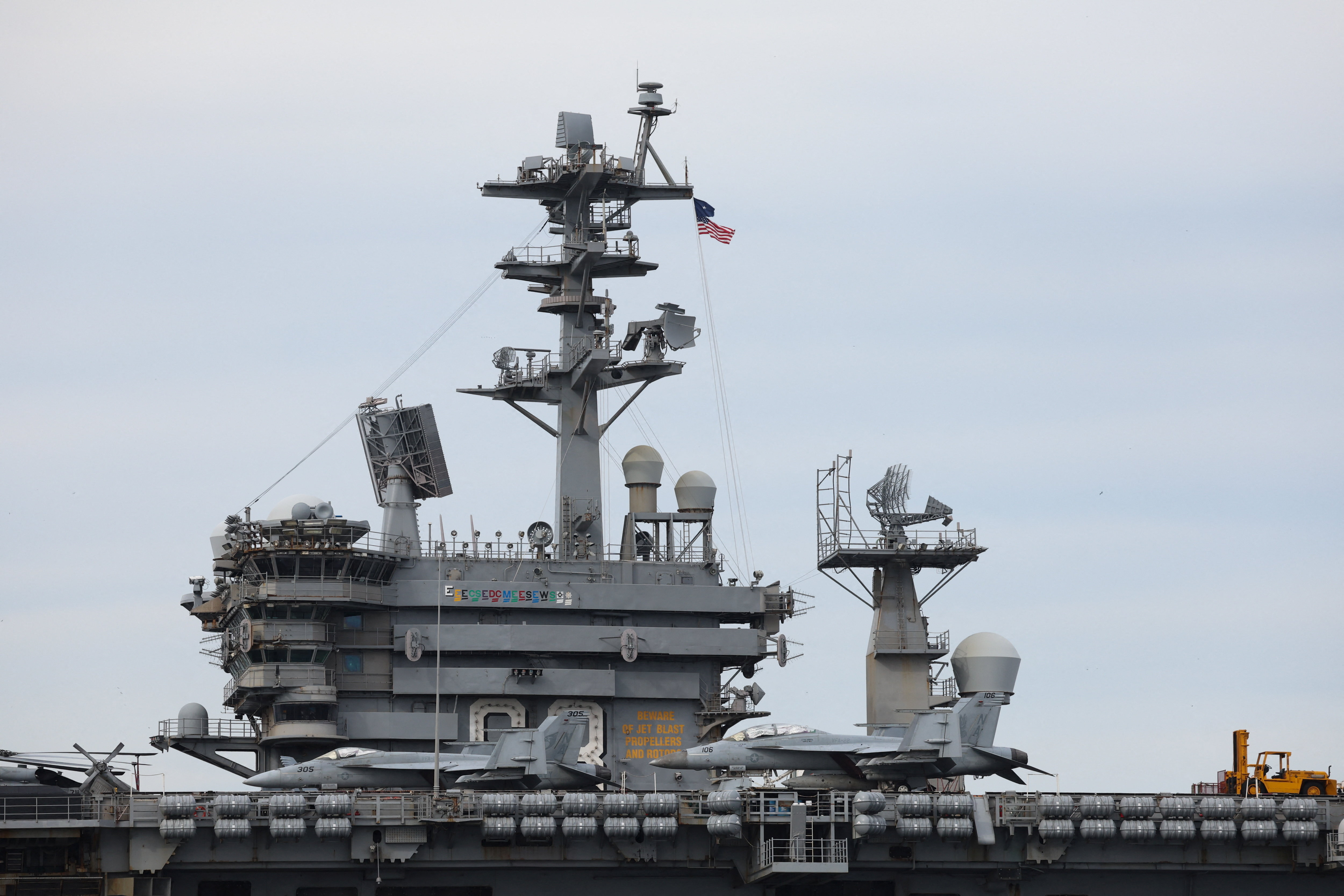 U.S. Navy aircraft carrier USS Nimitz is anchored in the Guanabara Bay as part of the Southern Seas 2026 deployment for joint naval exercises, while the Brazilian Navy conducts radiological monitoring operations near its position, in Rio de Janeiro, Brazil May 8, 2026.