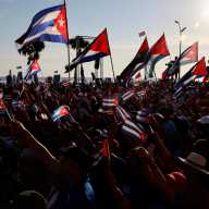 People gather ahead of a pro-government rally called by Cuban authorities to protest U.S. policies toward the island, including the indictment of former Cuban president Raul Castro, in Havana, Cuba, May 22, 2026.