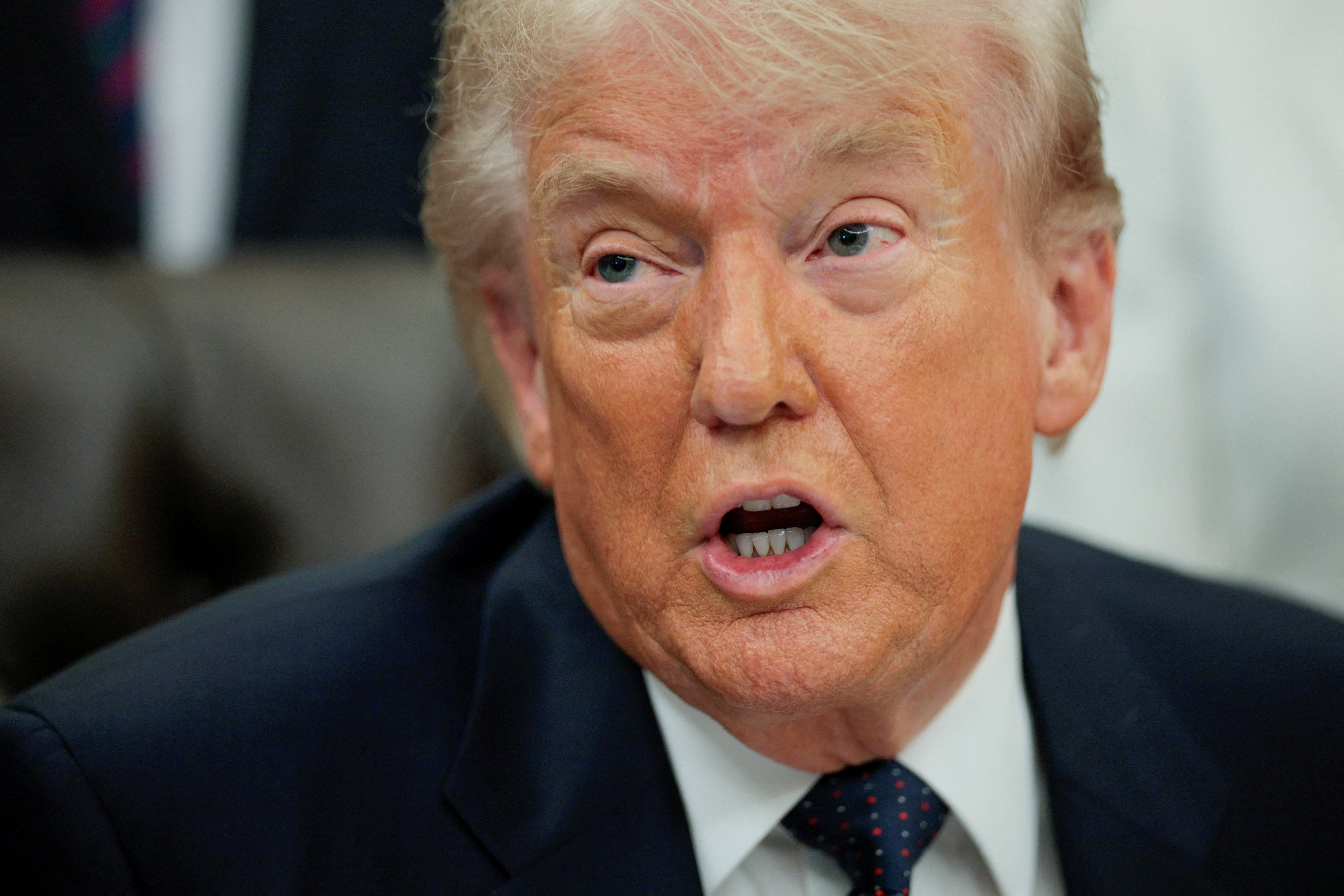U.S. President Donald Trump speaks during an event to sign a memorandum in the Oval Office at the White House in Washington, D.C., U.S., May 5, 2026.