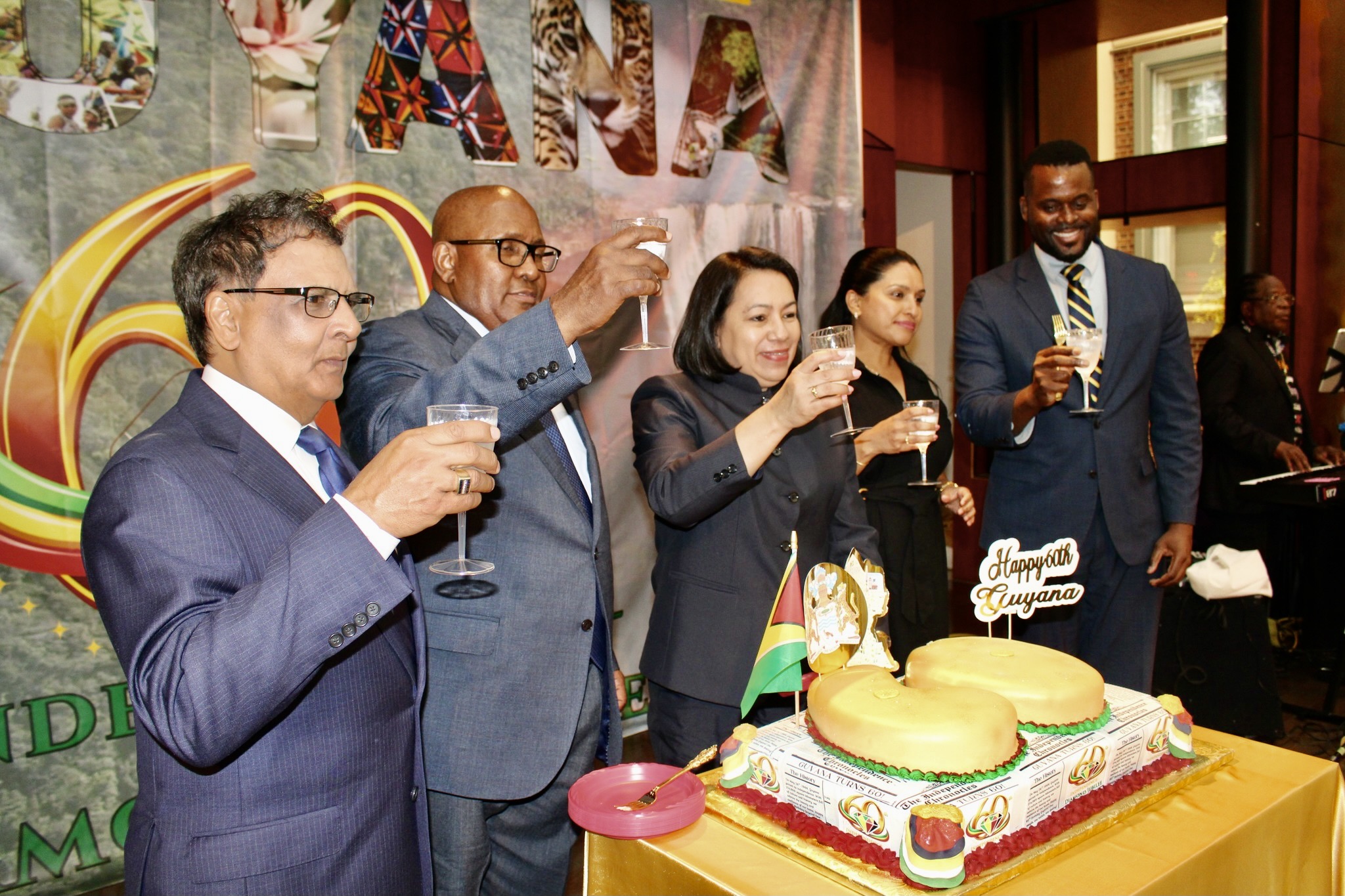 From left: Advisor Fazal Yusuff; Guyana Consul General to New York Ambassador Michael E. Brotherson; Permanent Representative to the United Nations, Ambassador Carolyn Rodrigues-Birkett; Ambassador Trishala Persaud; and Chair, CARICOM Consular Corps, Consul General of St. Lucia to New York Jeremiah Hyacinth, toast to Guyana's 60th Independence Anniversary in the Helen Marshall Cultural Centre on May 26, 2026.