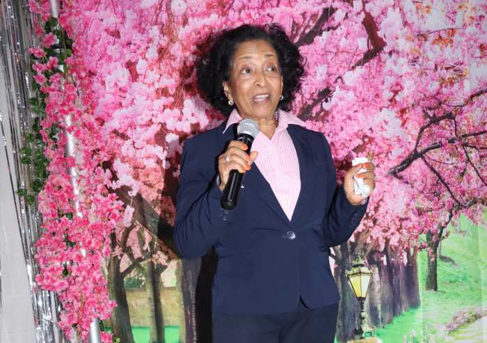 Dr. Jacqueline Gaymes-Jones gives an acceptance speech.