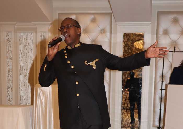 Hilton Samuel serenades honorees at the ceremony.