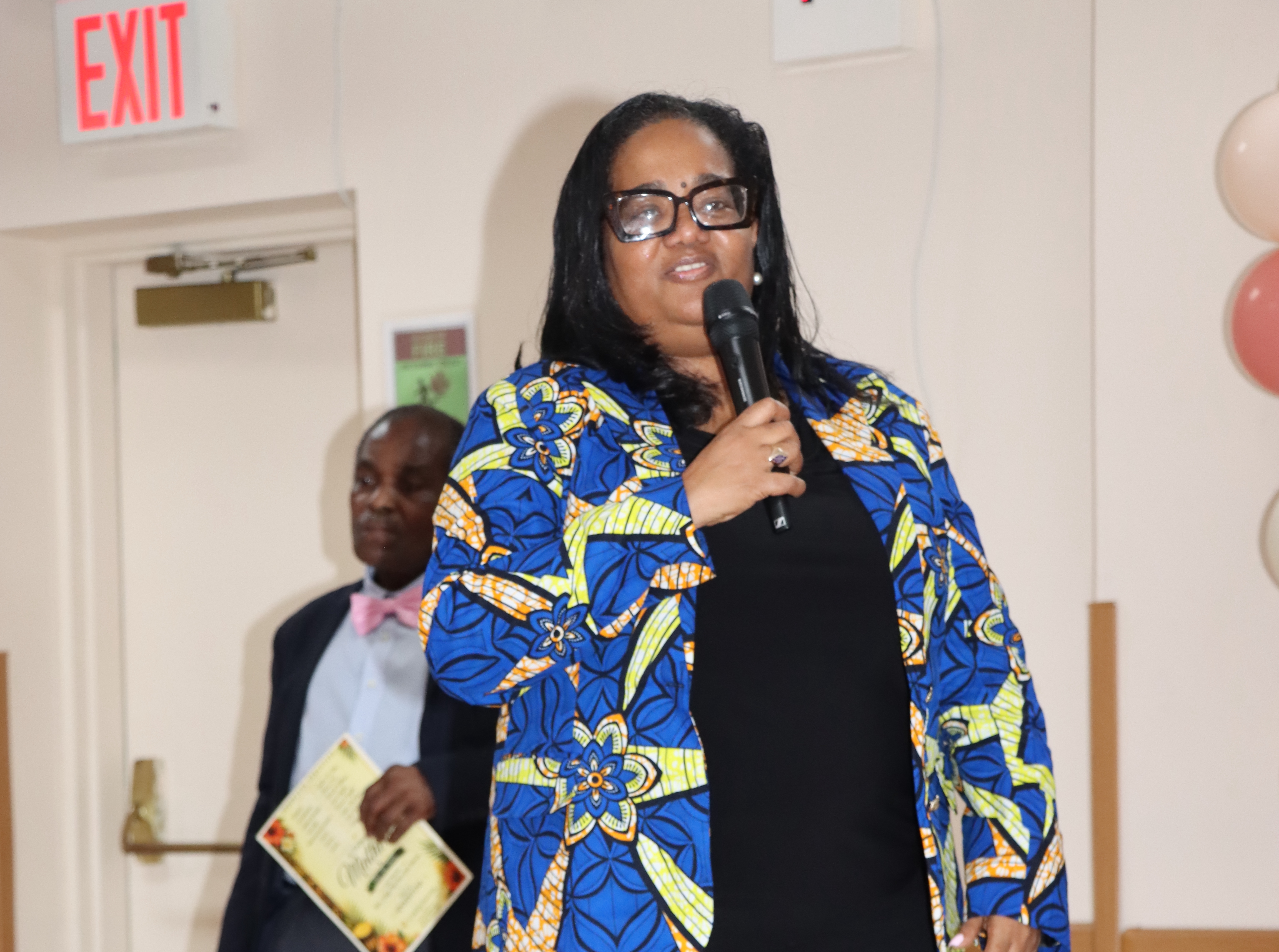 St. Vincent and the Grenadines Ambassador to the United Nations Vynette Frederick addresses ceremony. SPOONY General Secretary Kenneth Williams is in background.