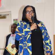 St. Vincent and the Grenadines Ambassador to the United Nations Vynette Frederick addresses ceremony. SPOONY General Secretary Kenneth Williams is in background.