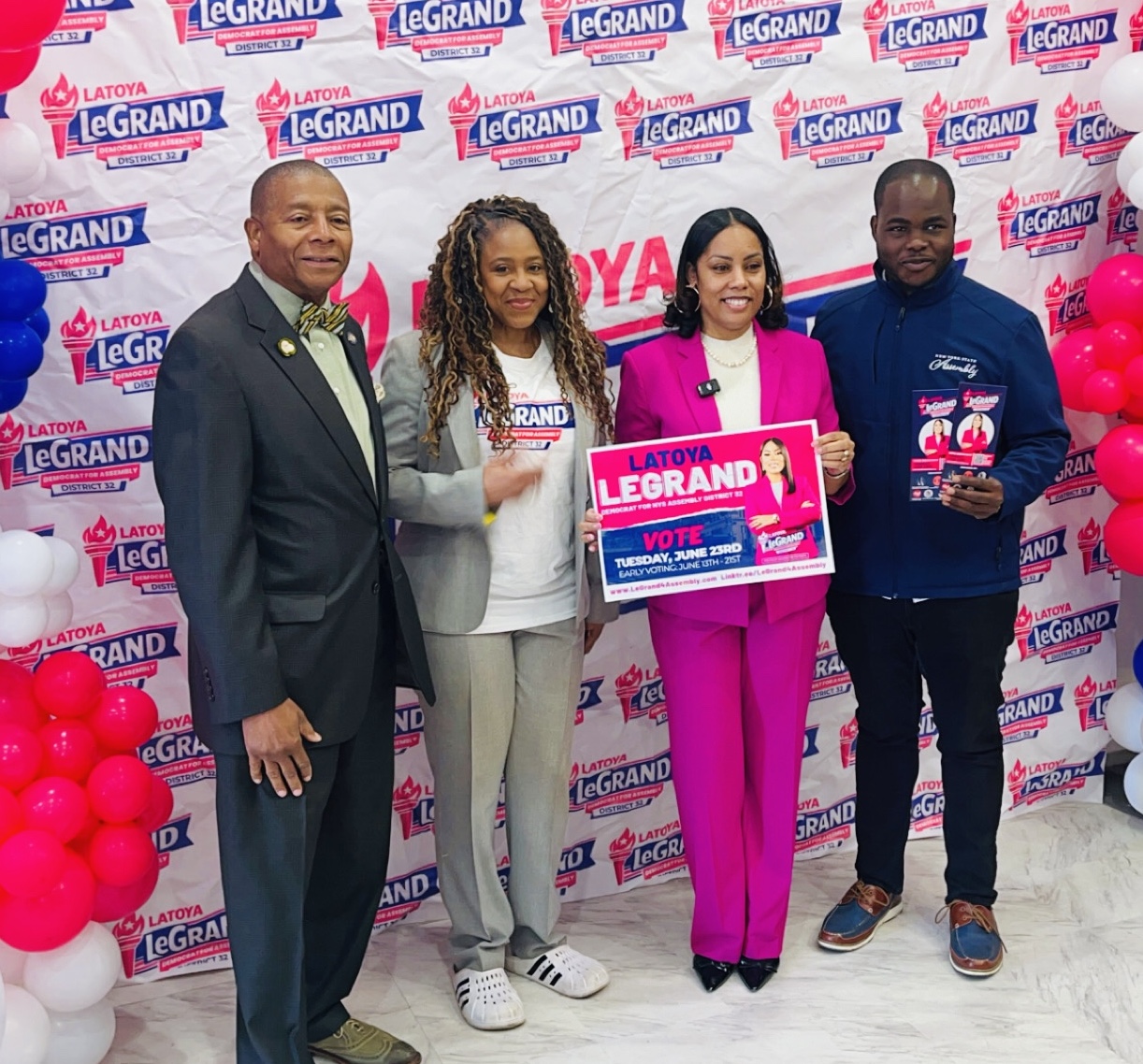 James Sanders Jr., Lisa George, Latoya LeGrand, and Khaleel Anderson gather during LeGrand’s campaign headquarters opening and press conference in Jamaica, Queens, as community leaders rally behind her bid for State Assembly District 32.