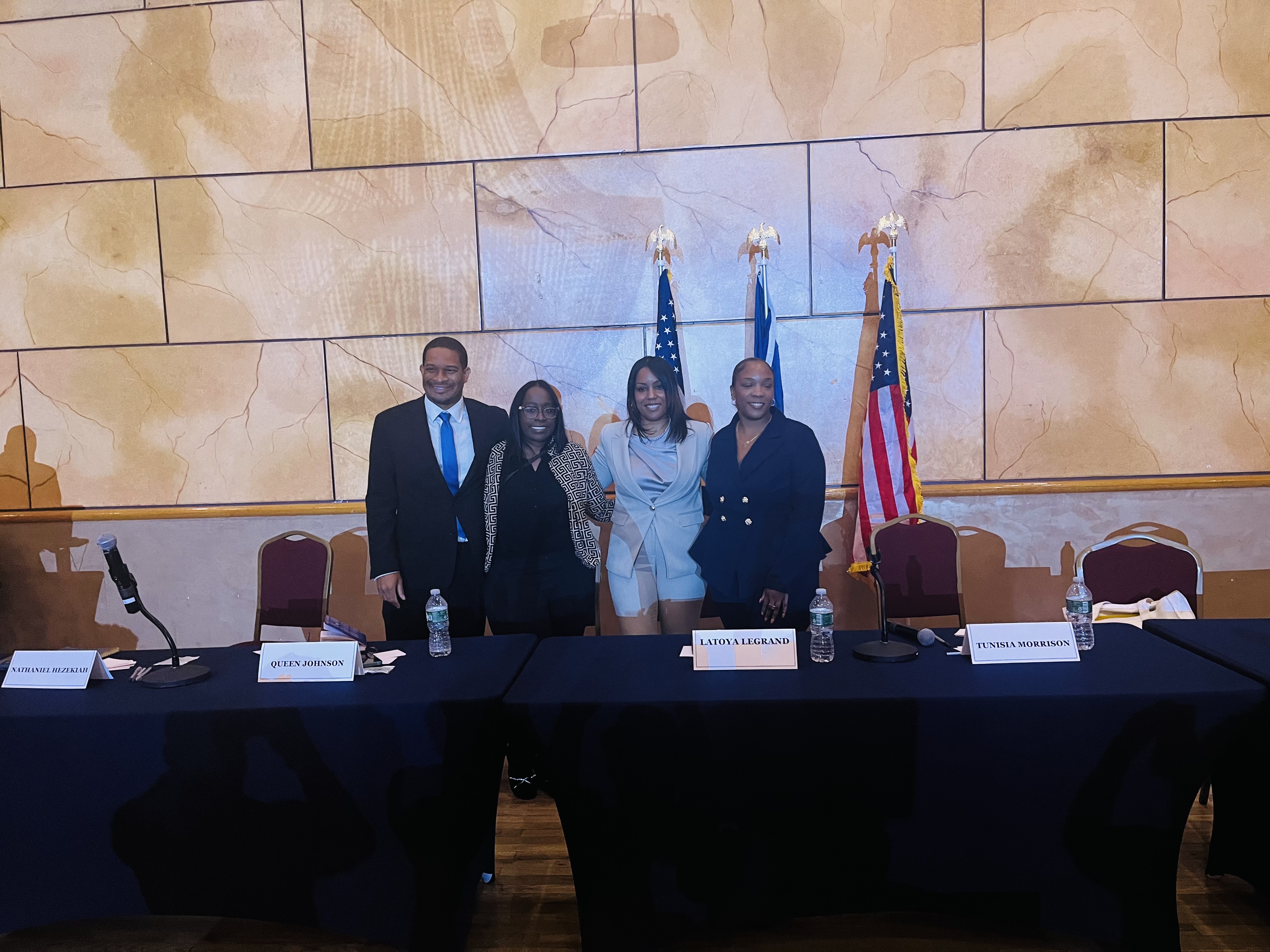 All four District 32 Assembly candidates — Nathaniel Hezekiah, Queen Johnson, Latoya LeGrand, and Tunisia Morrison —pose together at a candidate forum held on Saturday, May 16, 2026, at the Rochdale Village Grand Ballroom, 165-69 137th Avenue, Jamaica, Queens, NY.