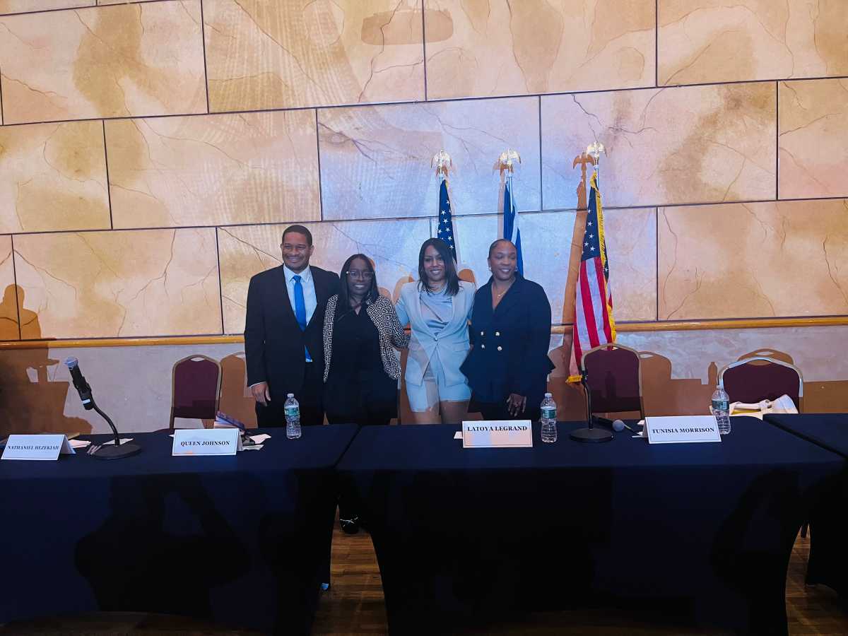 All four District 32 Assembly candidates — Nathaniel Hezekiah, Queen Johnson, Latoya LeGrand, and Tunisia Morrison —pose together at a candidate forum held on Saturday, May 16, 2026, at the Rochdale Village Grand Ballroom, 165-69 137th Avenue, Jamaica, Queens, NY.