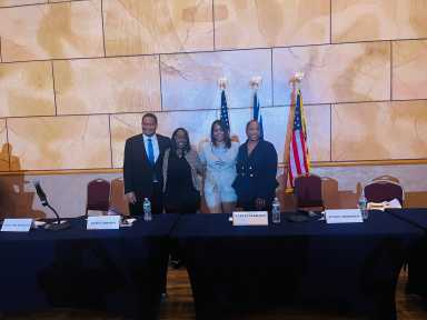 All four District 32 Assembly candidates — Nathaniel Hezekiah, Queen Johnson, Latoya LeGrand, and Tunisia Morrison —pose together at a candidate forum held on Saturday, May 16, 2026, at the Rochdale Village Grand Ballroom, 165-69 137th Avenue, Jamaica, Queens, NY.