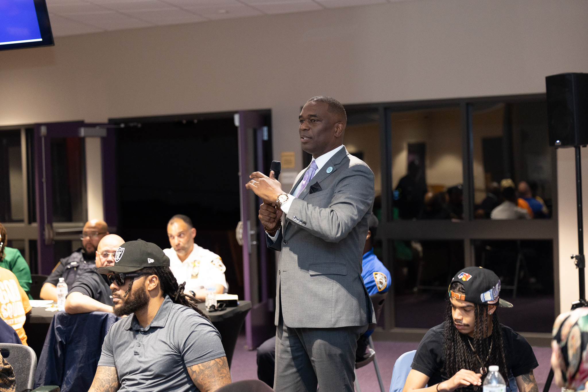 Pastor Gilford Monrose speaks to community leaders at Ebenezer Urban Ministry Center in Brownsville on the first day of the summit.