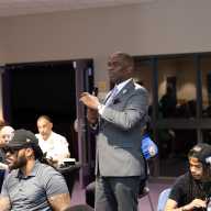 Pastor Gilford Monrose speaks to community leaders at Ebenezer Urban Ministry Center in Brownsville on the first day of the summit.