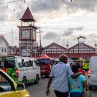 People walk outside the Stabroek Market in Georgetown, Guyana May 9, 2026.