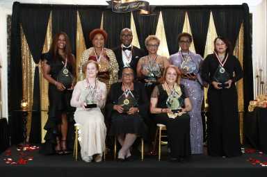 A group shot at the Crown of Care Gala – Scholarship Fundraising Dinner and Awards Ceremony at the elegant El Caribe Country Club on Strickland Avenue in Brooklyn.