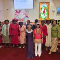 The Rev. Derwin Grant, pastor of Trinity Methodist Church, left, with honorees on Mother's Day 2026.