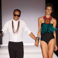 Awarding-winning, Brooklyn-based Fashion Designer Roger Gary, left, with a model wearing a swimwear from his Spring, Summer Resort collection, recently shown on the runway of Summer Sizzle fashion show, in the British Virgin Islands.